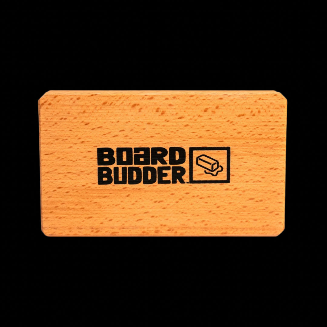 Board Budder logo on the wooden handle of the Budder Brush
