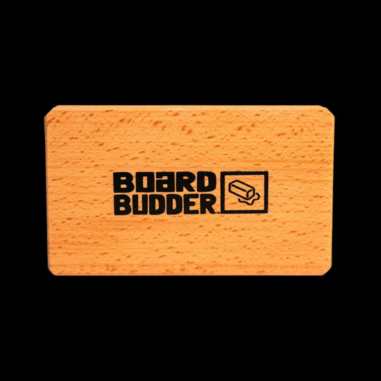 Board Budder logo on the wooden handle of the Budder Brush