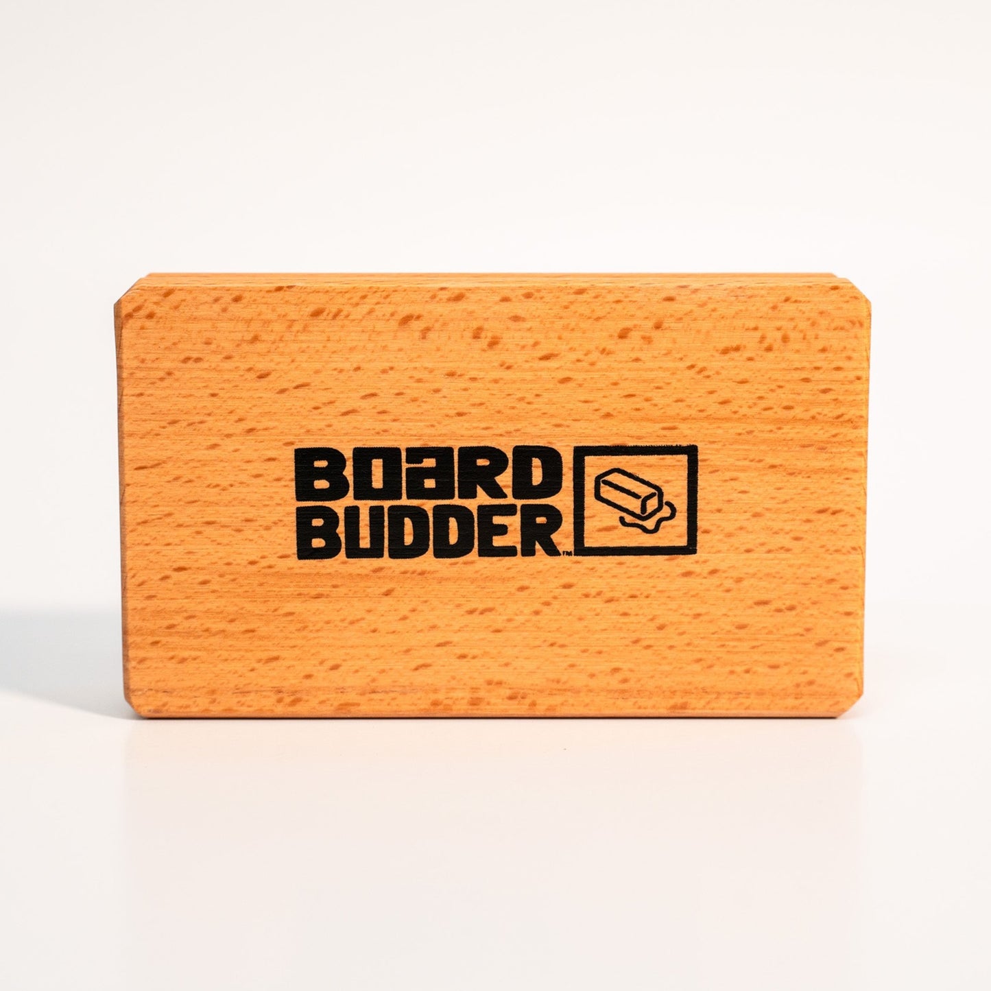 Board Budder logo on the wooden handle of the Budder Brush