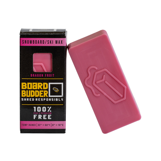 Warm Temperature Pink Ski and Snowboard Wax Leaning Against Packaging | Eco-Friendly Wax for 32º to 50ºF