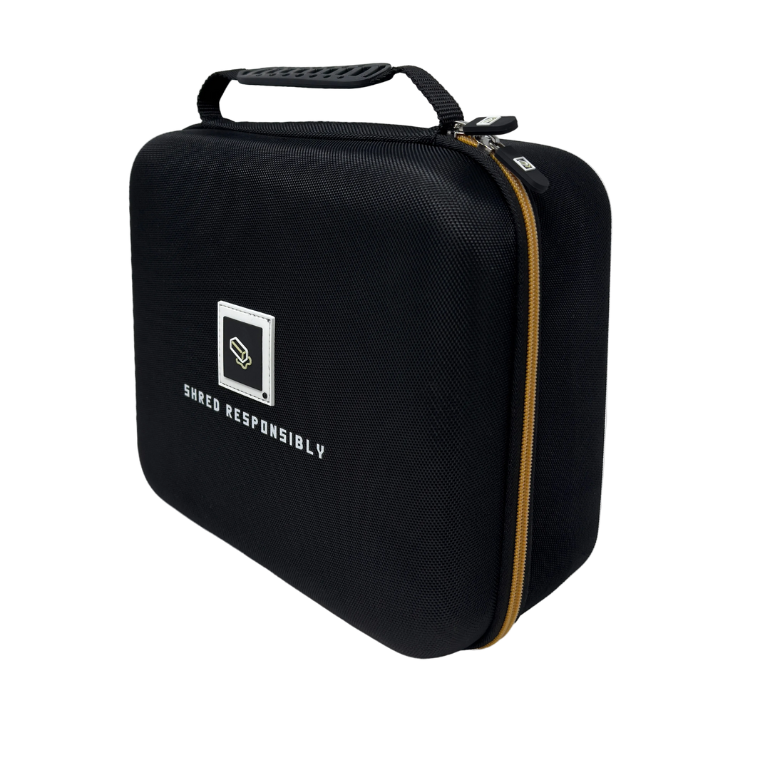 Black carrying case with 'Shred Responsibly' logo and Board Budder logo on a white background