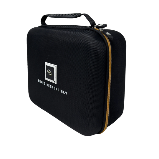 Black carrying case with 'Shred Responsibly' logo and Board Budder logo on a white background